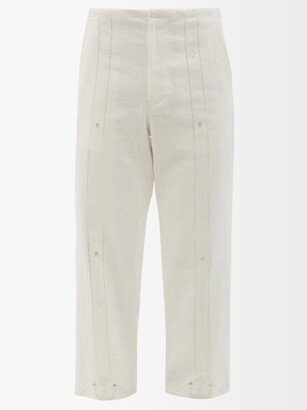 Kuro Embroidered And Ladder-lace Linen Trousers - White