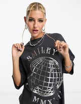 Thumbnail for your product : ASOS DESIGN Smiley Collab oversized T-shirt in foil slogan license graphic in charcoal