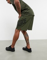 Thumbnail for your product : Nike Training flex shorts with camo logo in khaki
