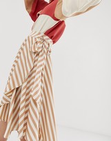 Thumbnail for your product : GHOSPELL exclusive midi wrap skirt with tie waist in stripe satin