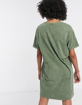 Thumbnail for your product : Bershka acid wash slogan t-shirt dress in khaki