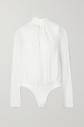 sheer turtleneck bodysuit