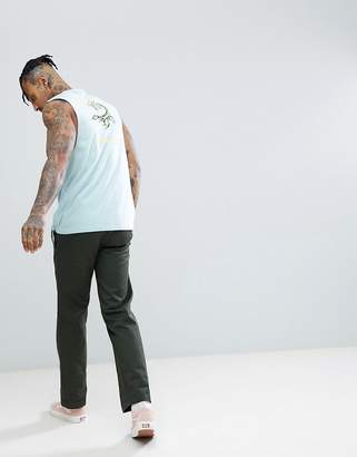 ASOS Design DESIGN sleeveless t-shirt with dropped armhole with scorpian rose back print