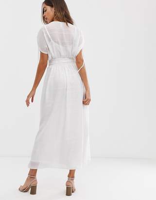 ASOS Design DESIGN wrap front maxi dress with buckle belt in self stripe