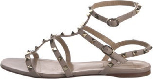 Valentino Leather Gladiator Sandals Neutrals Rockstud Accents Studded Accents Multistrap Unfortunately, due to restrictions, this item may not be eligible for shipping in all areas.
