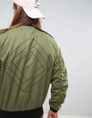 ASOS DESIGN Oversized Bomber Jacket With Ruche Detail and Back Print in Khaki
