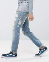 Thumbnail for your product : ASOS Stretch Slim Jeans In Vintage Mid Wash With Heavy Rips