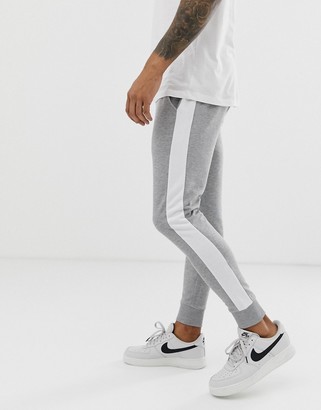 ASOS DESIGN skinny joggers with side stripe in grey marl