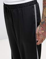 Thumbnail for your product : Reclaimed Vintage Inspired Joggers In Black With Taping