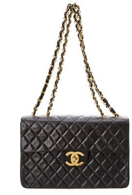 Chanel Black Quilted Lambskin Leather Maxi Single Flap Bag.