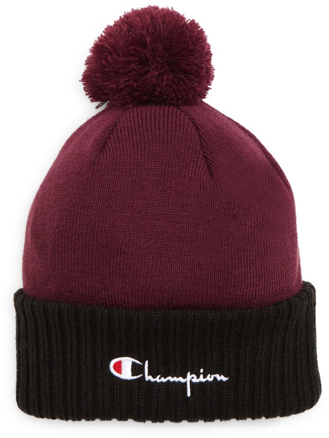 champion toque with pom pom