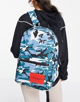 Thumbnail for your product : Calvin Klein Sports zip backpack 45cm in blue green camo print