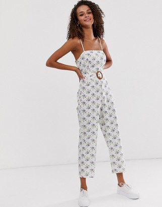 ASOS DESIGN strappy pinny belted jumpsuit in floral print