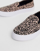 Thumbnail for your product : ASOS DESIGN Wide Fit Dexter slip on plimsolls in leopard