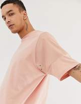 Thumbnail for your product : ASOS DESIGN oversized t-shirt with contrast panels in woven fabric in pink