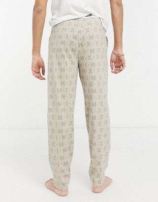 ASOS DESIGN lounge trousers with roman numeral print