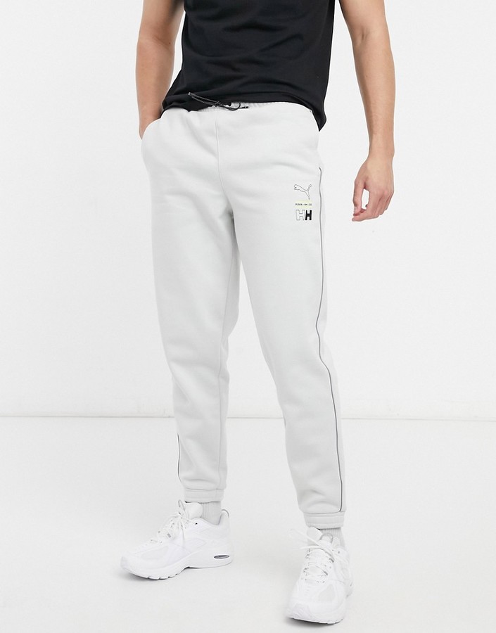 Puma x Helly Hansen logo taped sweatpants in gray - ShopStyle Activewear  Pants