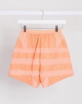 Thumbnail for your product : adidas adicolor large logo shorts in coral