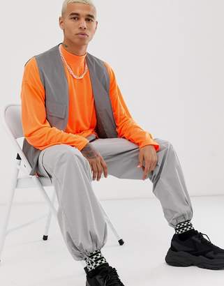 ASOS Design DESIGN oversized long sleeve jersey turtle neck in neon orange