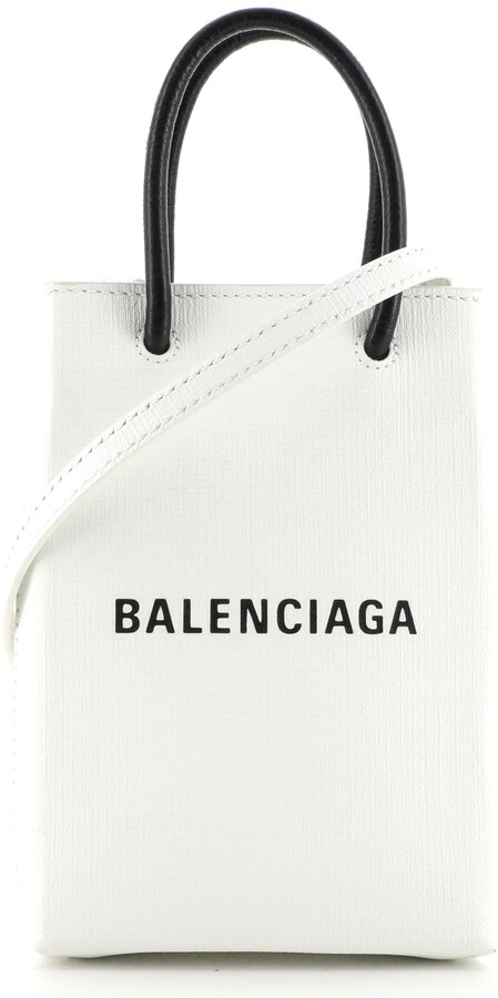 Balenciaga Shopping leather phone holder - ShopStyle Satchels & Top Handle  Bags