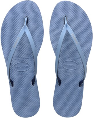 grey rainbow flip flops
