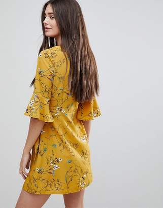 Girls On Film Floral Wrap Dress With Fluted Sleeve
