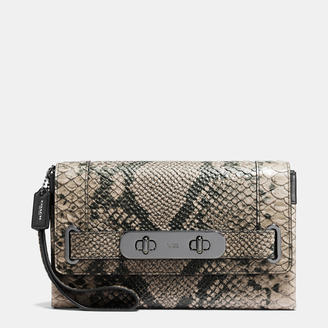 Coach Swagger Clutch In Python Embossed Leather