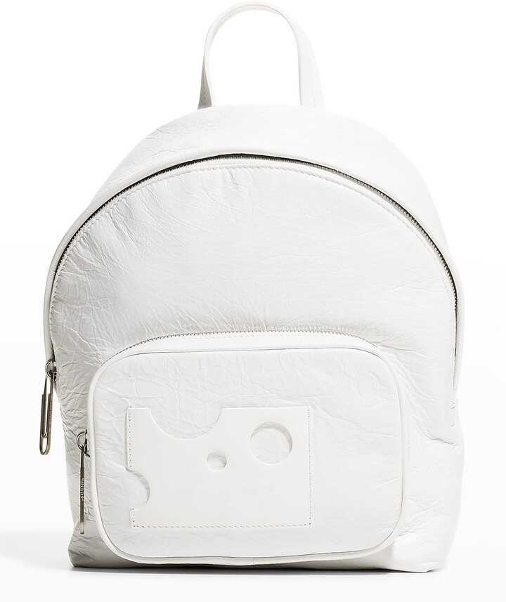 small white backpack