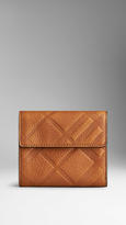 Thumbnail for your product : Burberry Embossed Check Leather Foldover Wallet