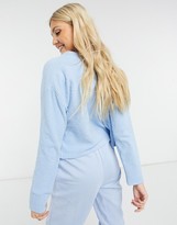 Thumbnail for your product : Monki Cora fluffy knitted cardigan in light blue 4 piece co