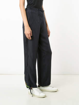MHI tiger embroidered track pants