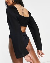 Thumbnail for your product : ASOS DESIGN fuller bust bunny tie front wide sleeve beach top co-ord in black