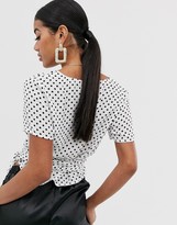 Thumbnail for your product : NA-KD polka dot wrap front crop top in white