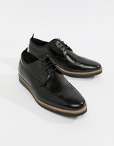 Thumbnail for your product : ASOS DESIGN brogue shoes in black leather with wedge sole