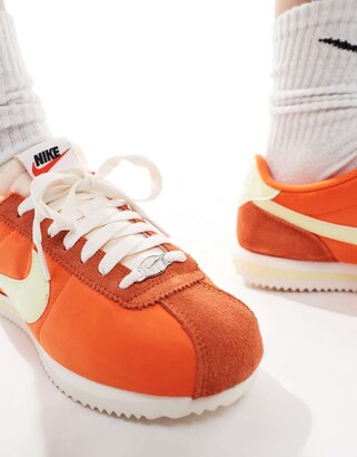firewood orange nike cortez
