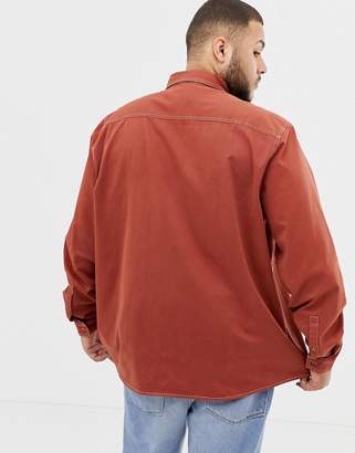 ASOS Design DESIGN Plus overshirt with contrast stitching in rust