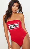 Thumbnail for your product : PrettyLittleThing Red Japan Slogan Bandeau Thong Bodysuit