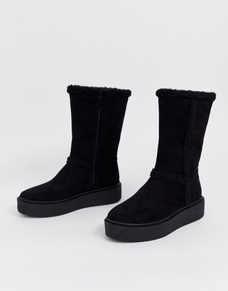 ASOS DESIGN Aquarius faux fur flat boots in black
