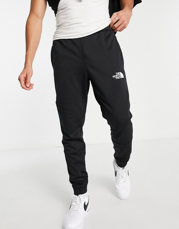 The North Face Training Mountain Athletic joggers in black - ShopStyle  Trousers