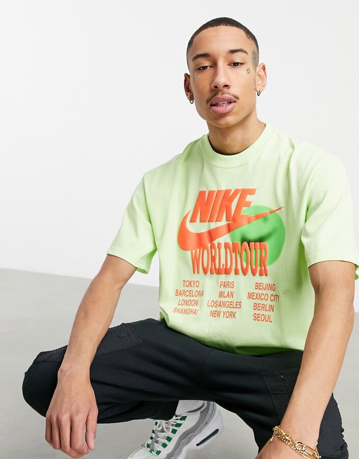 Nike World Tour Pack graphic oversized T-shirt in lime - ShopStyle