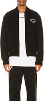 Thumbnail for your product : Off-White Arrow Varsity Jacket in Black & White | FWRD