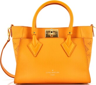 Louis Vuitton Orange Tote Bags