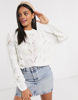 Pieces sweater with knitted pattern in cream