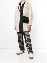 Thumbnail for your product : Homme Plissé Issey Miyake Abstract Print Loose Fit Jeans