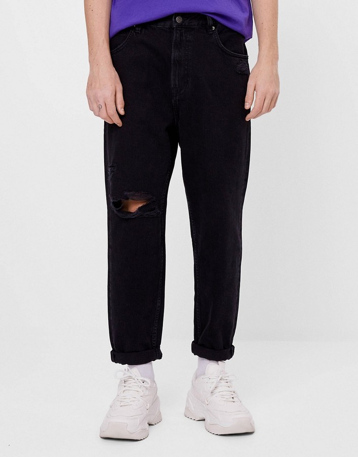 Bershka join life loose fit jeans with rips in black - ShopStyle