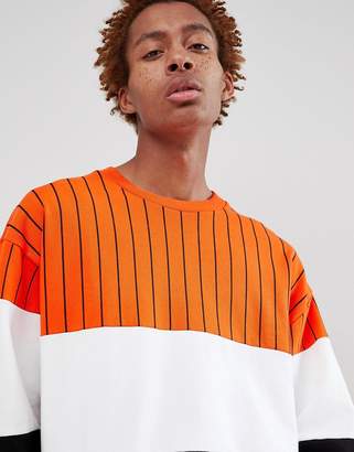 ASOS Design DESIGN oversized sweatshirt with colour block stripes