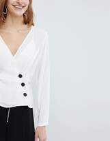 Thumbnail for your product : ASOS Design Wrap Top With Contrast Button Detail