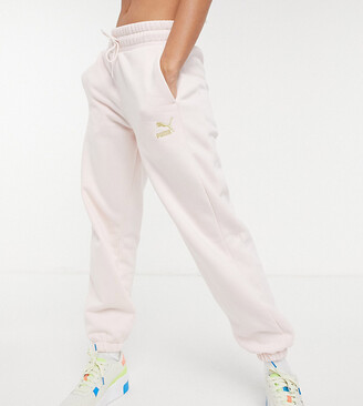 Puma oversized sweatpants in pink and gold - ShopStyle Activewear Pants