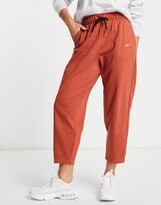 Thumbnail for your product : Nike Lounge essential fleece pants in brown marl