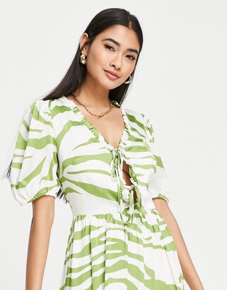 NEVER FULLY DRESSED zebra print midi dress in green